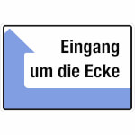 Hinweisschild Eingang um die Ecke