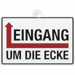 Hinweisschild Eingang um die Ecke