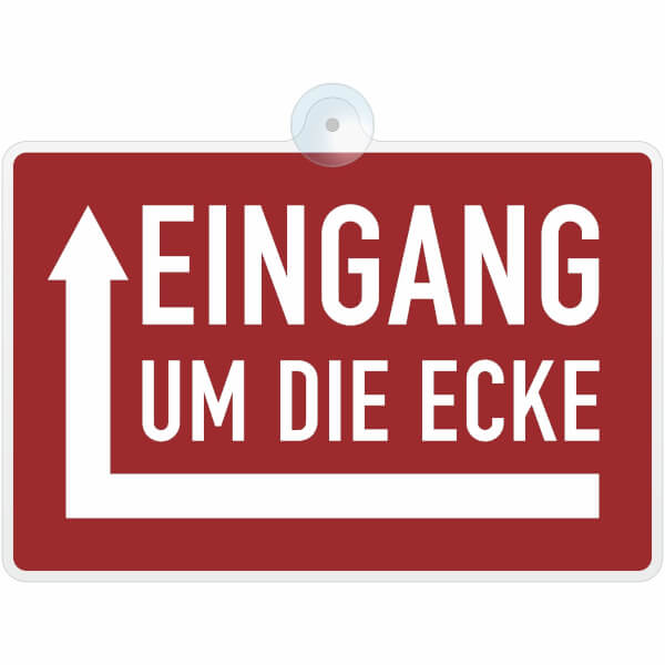 Hinweisschild Eingang um die Ecke